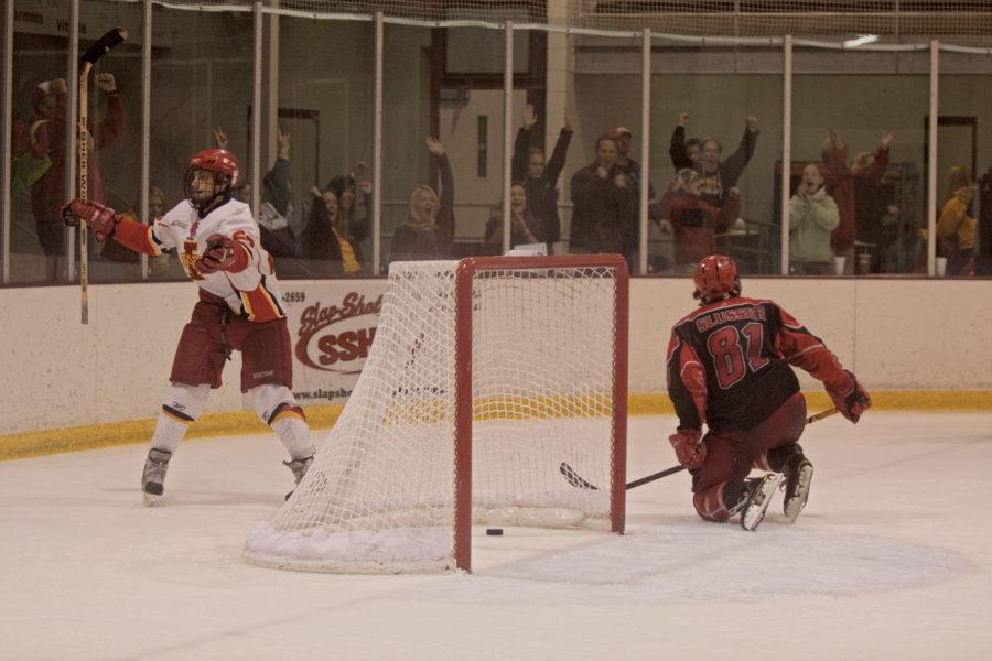 Forward Chris Cucullu celebrates the last goal against Davenport University on Saturday, Oct. 16, at the Ames/ISU Ice Arena. The Cyclones ended the Panthers six-game winning streak with a 5-3 victory.