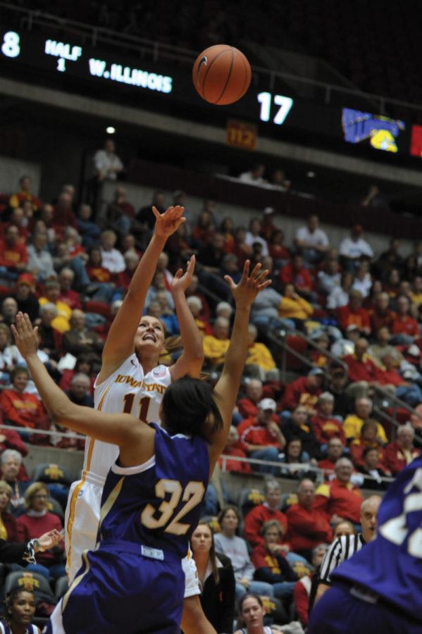 Cyclone Kelsey Bolte attempts to shot over Western Illinois Brittany Demery on Saturday at Hilton. Cyclones won 58 to 32. 