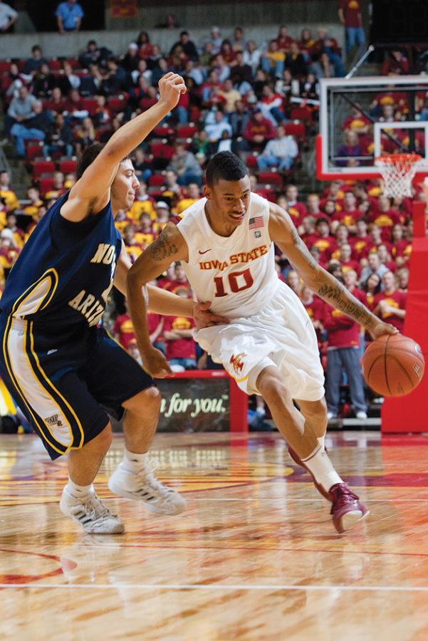 Diante Garrett drives the ball in the game against Northern Arizona on Nov. 12 at Hilton Coliseum.