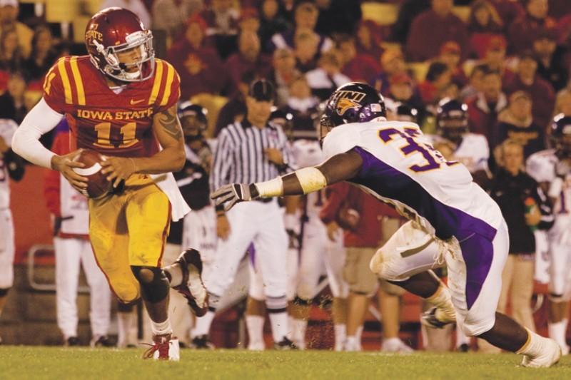 Quarterback Jerome Tiller eludes a tackle in the second half of Saturdays game against UNI at Jack Trice Stadium. The Cyclones defeated the Panthers 27-0.