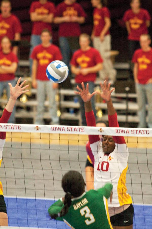 Outside hitter Victoria Henson, jumps up for a block against Baylor on Wednesday at Ames Highschool. Henson had 11 kills and 28 total attacks to help the Cyclones gain a 3-0 shutout against the Bears.