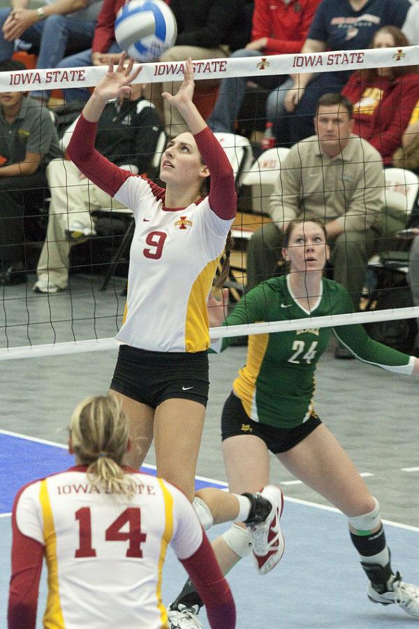 Setter Alison Landwehr sets the ball during the Iowa State-Baylor game Wednesday, Nov. 3, at Ames High School.