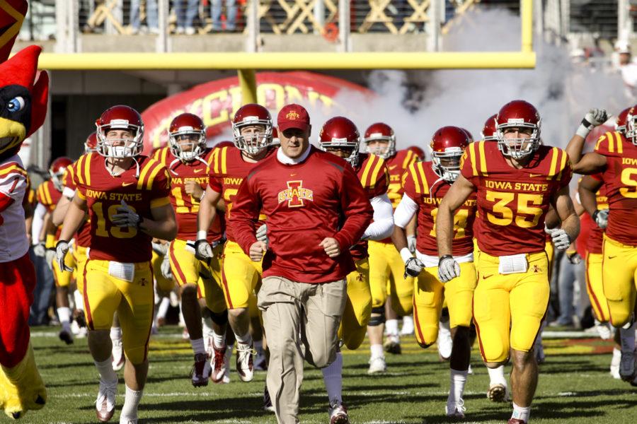 Coach+Paul+Rhoads+enters+the+field+with+the+Iowa+State+football+team+on+Saturday%2C+Nov.+6.+The+Cyclones+played+the+Cornhuskers+and+lost+in+overtime+with+a+score+of+31-30.