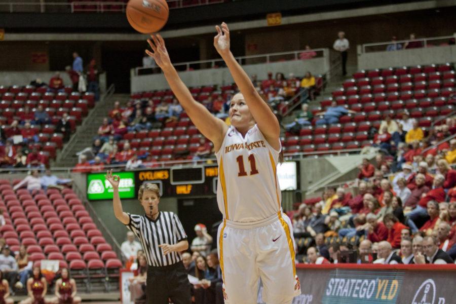 ISU+senior+Kelsey+Bolte+launches+a+three-point+shot+in+the+second+half+of+Mondays+game+against+Cal+State+Northridge.+Bolte+hit+four+three-pointers+to+help+the+Cyclones+defeat+the+Matadors+93-47.+Photo%3A+Dan+Tracy%2FIowa+State+Daily