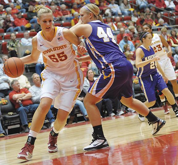 Cyclone Anna Prins attempts to pass Alyssa Van Klei during the game on Thursday, Nov. 4 at Hilton Coliseum. Cyclones won 87-48.