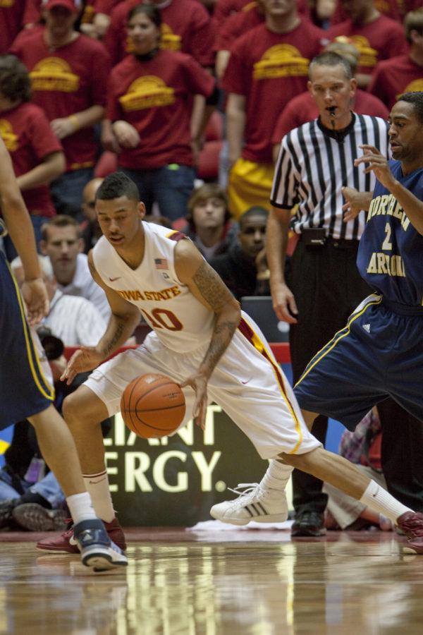 Guard Diante Garrett drives the ball toward the basket during the game against Northern Arizona on Friday, Nov. 12 in Hilton Coliseum. Garrett scored a total of 19 points throughout the game.
