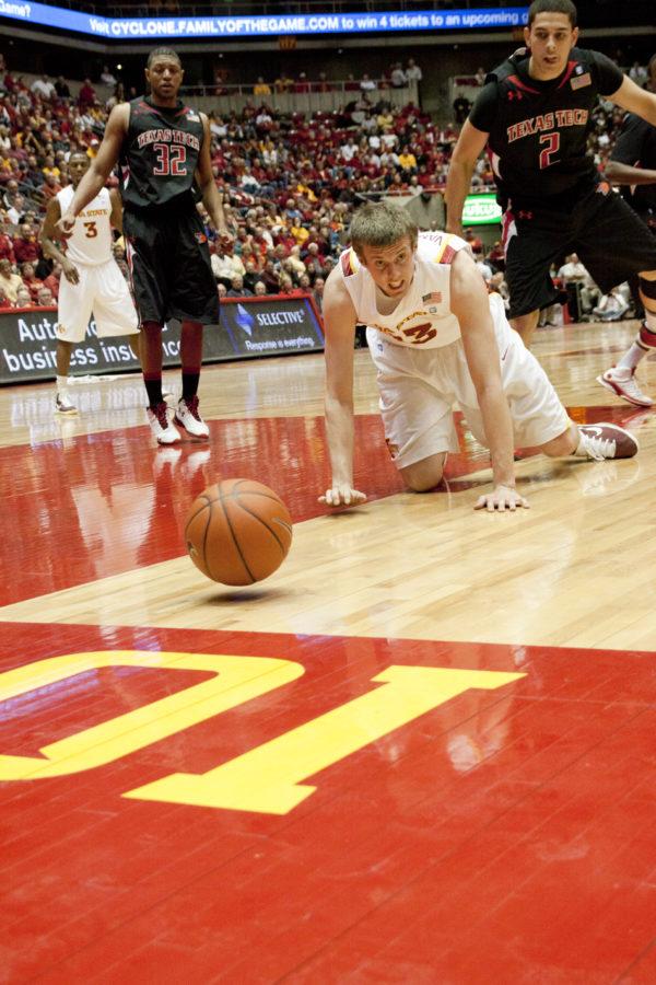 Forward Jamie Vanderbeken crawls for the ball as it rolls out of bounds. The Cyclones failed to produce when opportunity struck during their loss against Texas Tech on Wednesday, Jan. 26 at Hilton Coliseum. 