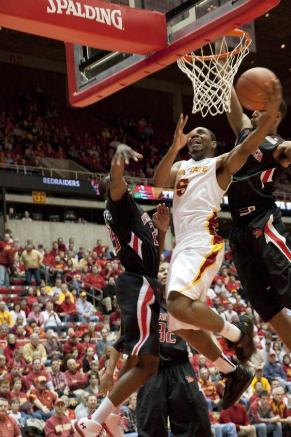 Jake Anderson lays the ball up under heavy pressure. Anderson had a team high of 12 rebounds. Iowa State lost against Texas Tech on Wednesday, Jan. 26 at Hilton Coliseum. 