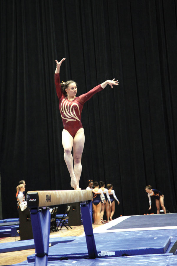 Michelle Shealy participates in the balance beam during the Friday, Jan. 7 meet with Auburn at Hilton Coliseum. Shealy helped the Cyclones defeat the Tigers 193.475 – 192.775. 