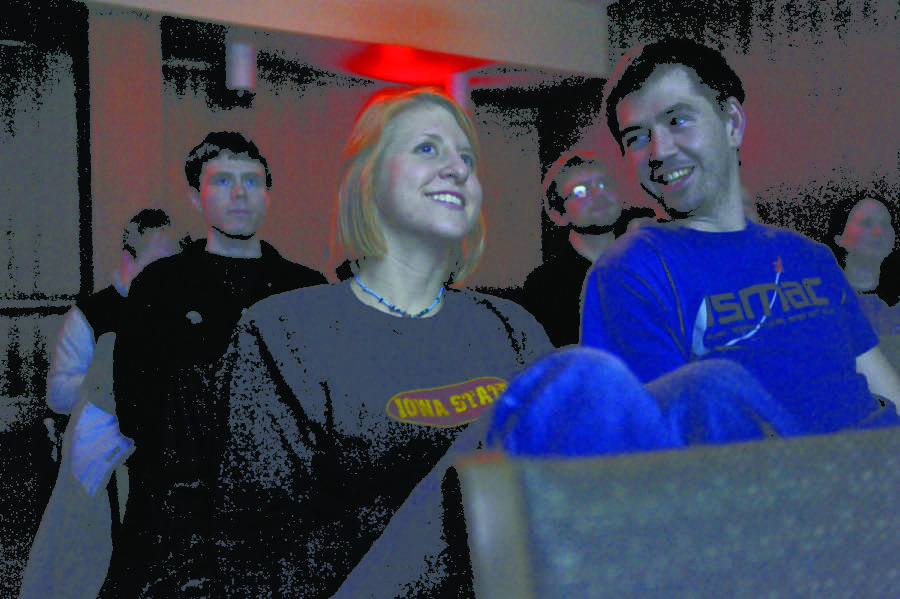 Joey Norris, junior in aerospace engineering, and Kristen Morrow, sophomore in global resource systems, talk before President Obama delivers his State of the Union address on Tuesday, Jan. 25, 2011, in the Gold Room of the Memorial Union.