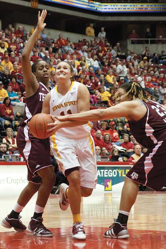 Kelsey Bolte goes on the offensive against Texas A&M on Saturday, Jan. 22 at Hilton Coliseum. The Cyclones lost 51-60 in what was a close battle the entire match.