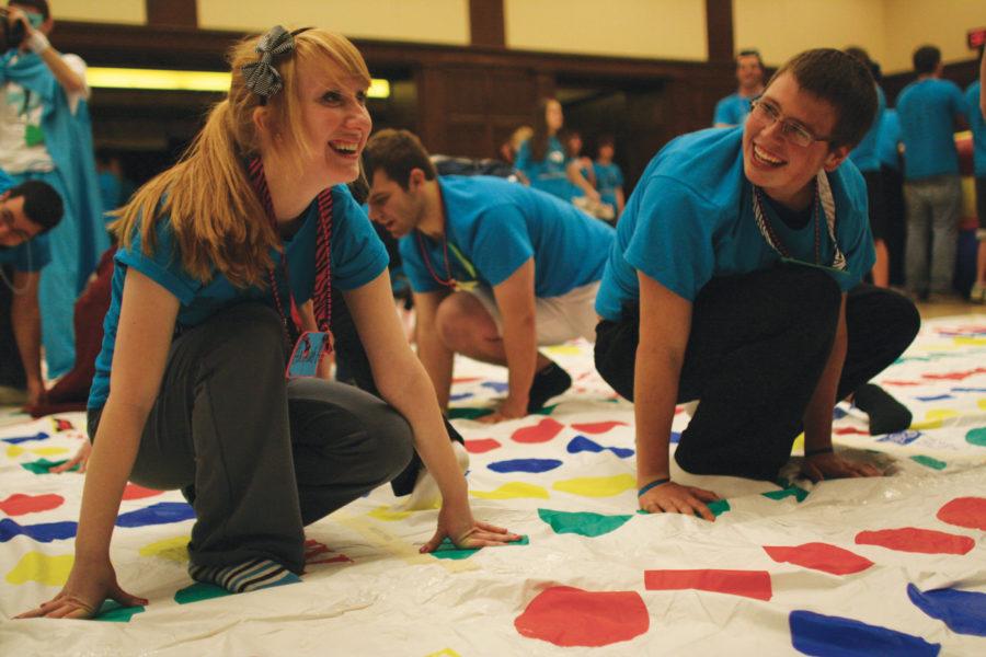 Hannah Hebron, senior in elementary education and Austin Dobbels, junior in agricultural biochemistry take a break from dancing and play twister during Dance Marathon Saturday, Jan. 22 at the Great Hall, Memorial Union. Dance Marathon is the largest student run philanthropy on campus raising money for the University of Iowa Children’s Hospital and  the Children’s Miracle Network.