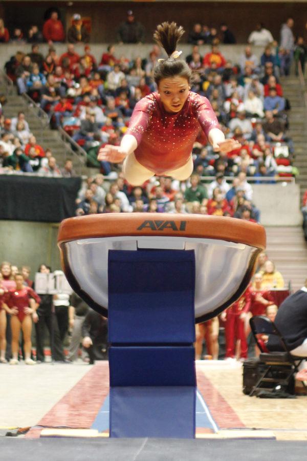 Michelle Browning starts her form for the vault event during the Beauty and the Beast event held Friday, Jan. 21 at Hilton Coliseum. Browning tied for sixth with three other participates with a score of 9.725 to help Iowa State gymnasts defeat Missouri 195.250 - 194.550.