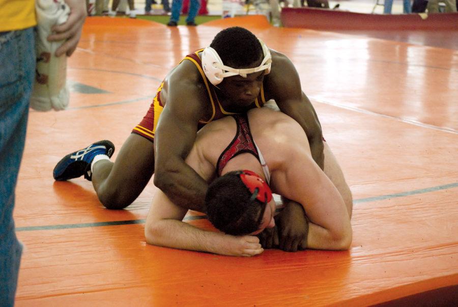 Iowa States Jerome Ward competes in the 197-pound wrestling championship against Nebraskas Matt Dwyer during the Harold Nichols Open on Saturday, Nov. 13 at the Bergstrom Indoor Training Facility. Ward progressed to the finals, where he was defeated 8-5 by Wartburg Colleges Byron Tate.