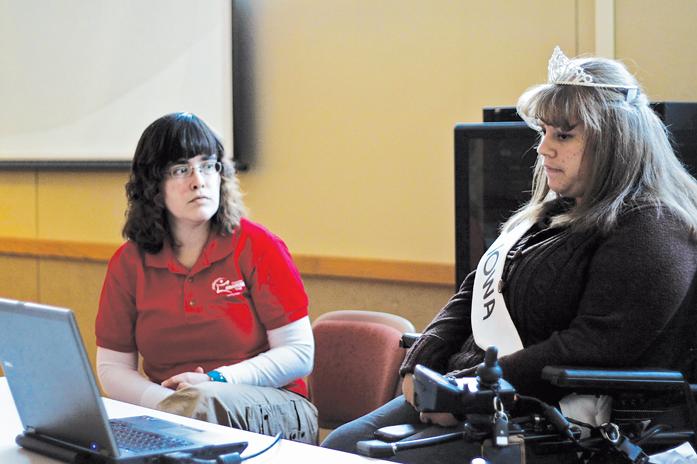 Axton Betz, left, graduate student in human development and family studies, and Samantha Edwards, senior in journalism and mass communication, speak about their disabilities during the student panel Monday at the Union Drive Community Center.