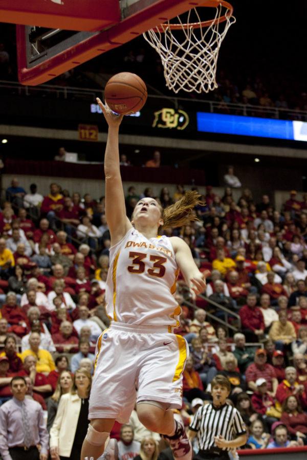 Forward Chelsea Poppens goes up to make a shot during the first half of the game on Saturday. Poppens score a total of nine points in the win over Colorado.