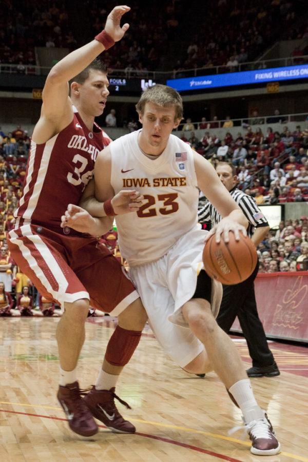 Jamie Vanderbeken attempts to work around the Oklahoma defense Saturday. The Cyclones lost their fourth-straight game at home 82-76.