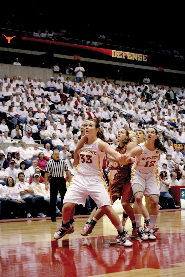 Iowa State forward Chelsea Poppens waits for a rebound Feb. 21 during the game against Texas at Hilton Coliseum. Poppens had a total of 11 rebounds during the game.
