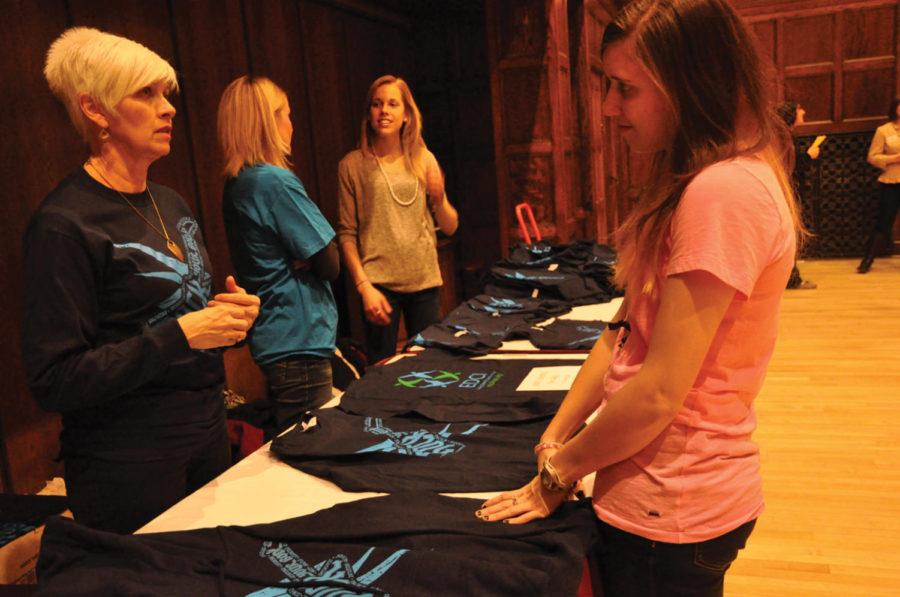 Eating Disorder Coalition of Iowa sold their T-Shirts before the lecture Thursday in the Great Hall of the Memorial Union. 