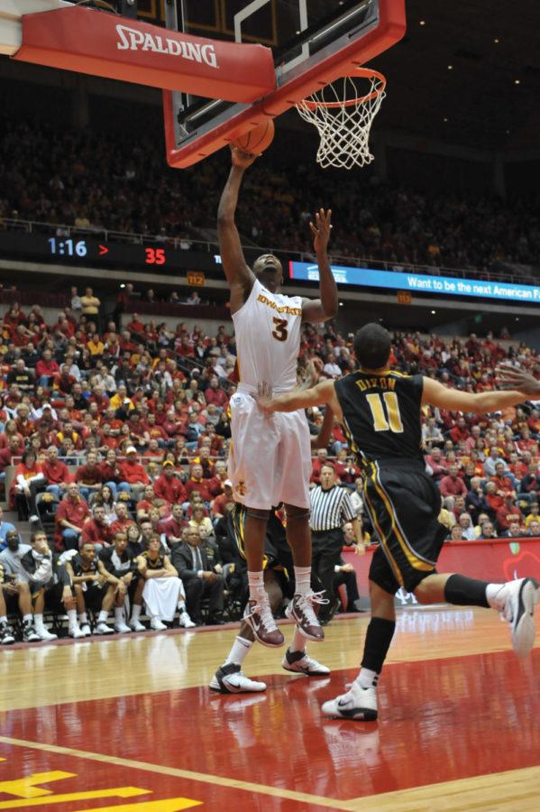 Forward Melvin Ejim goes for the lay-in during the game against Missouri on Saturday at Hilton Coliseum. Missouri defeated the Cyclones 76-70. 