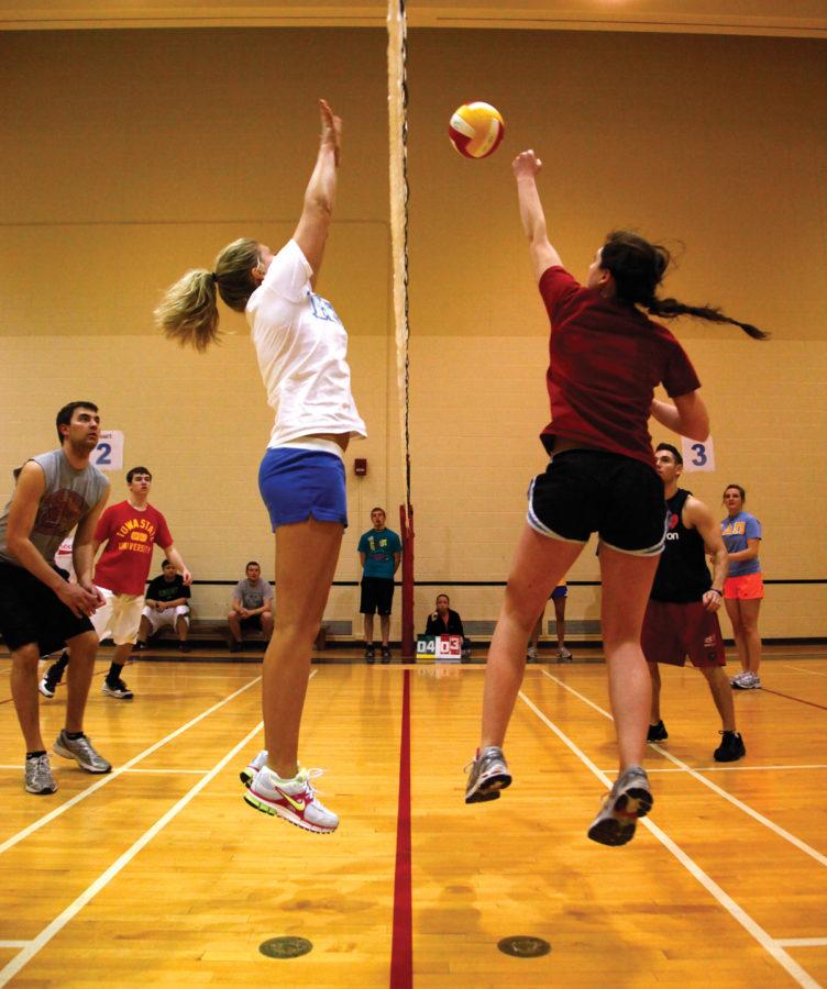 Molly Bryant spikes the ball at Greek Week Volleyball tournament Monday at Forker Gym. Photo: Clark Colby/Iowa State Daily


