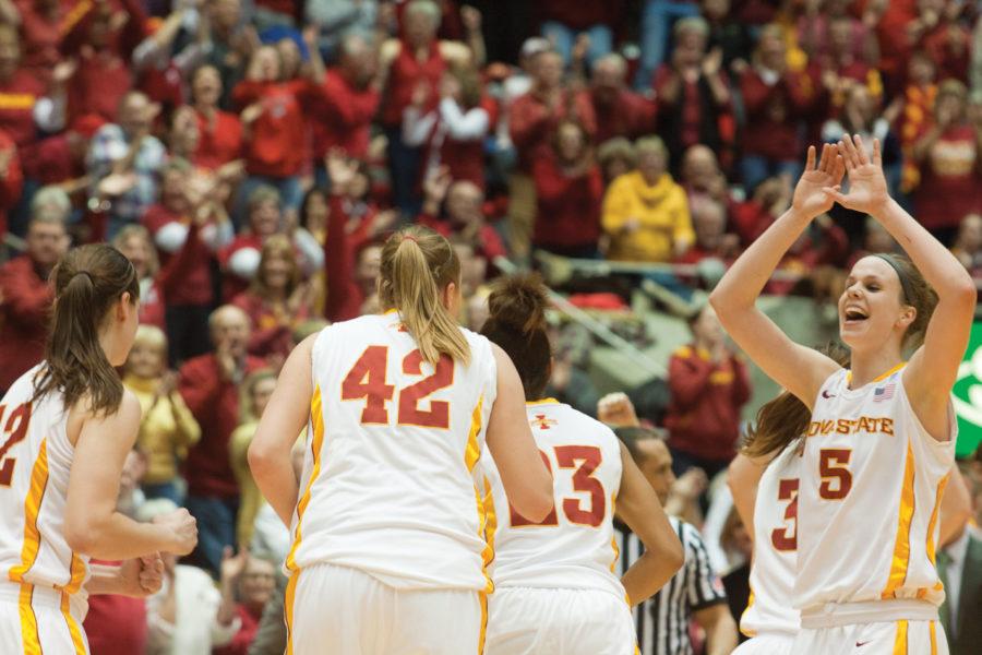 Forward Hallie Christofferson celebrates a shot on Tuesday, March 1 at Hilton Coliseum. The Cyclones defeated the Jawhawks 72-36.