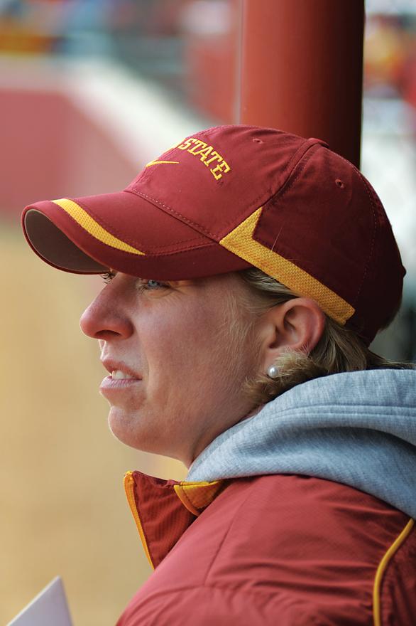 Coach Stacy Gemeinhardt-Cesler watches the game against Oklahoma State on June 11 at the ISU Sports Complex.