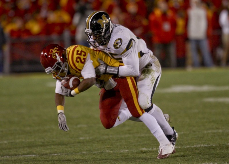 Running back Shontrelle Johnson is taken down by a Missouri opponent during the game Saturday. Iowa State failed to receive bowl eligibility after losing to Missouri 14-0.