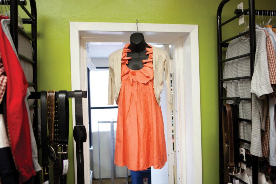 The Loft is located at 408 Kellog Ave in downtown Ames. They have an assortment of clothes ranging from teen to adult, as well as a selection of prom dresses. This peach Ryu dress is $10, and the tan Abercrombie & Fitch sweater is $7.75. Photo: David Livingston/ Iowa State Daily