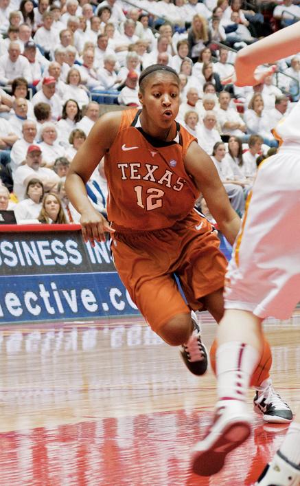 Texas guard Yvonne Anderson goes through a hole in Iowa State’s defense during the game held Feb. 21 in Hilton Coliseum. 