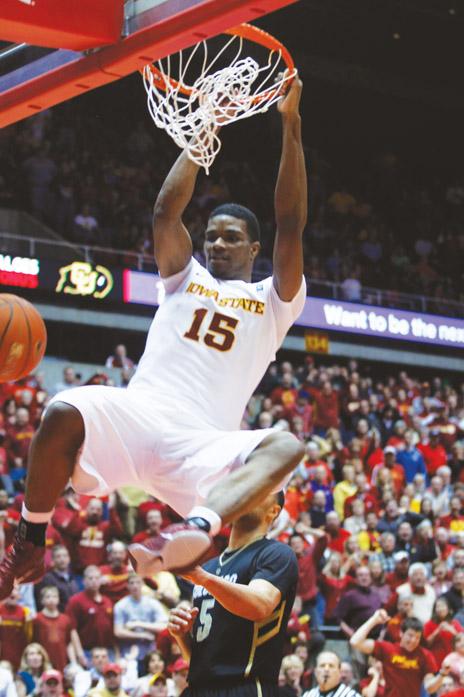 Forward Calvin Godfrey finishes a layup with a dunk. He led the team with 23 points for the night during the Iowa State - Colorado game held Wednesday, March 2 at Hilton Coliseum. 