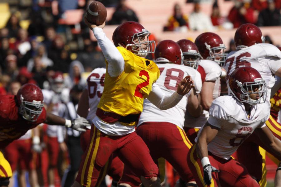 Quarterback Steele Jantz passes the ball over his opponents
during the spring game on Saturday, April 16. Jantz passed for a
total of 9 yards on the Gold team while passing for a total of 104
yards on the Cardinal team.
