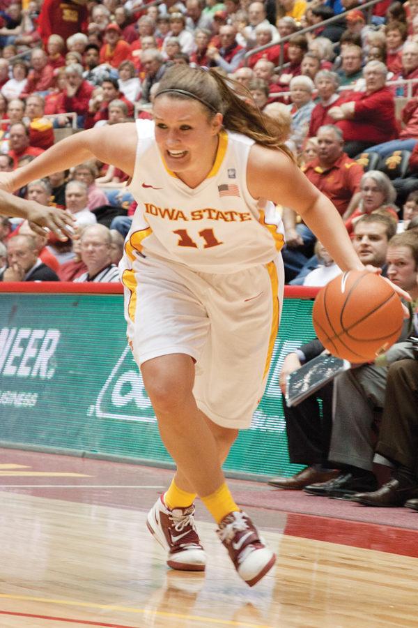 Guard Kelsey Bolte bolts past a Jayhawk opponent during the game March 1 at Hilton Coliseum. It was Bolte’s last regular season home game, and she will be leading the Cyclones to the Big 12 tournament Tuesday in Kansas City. 