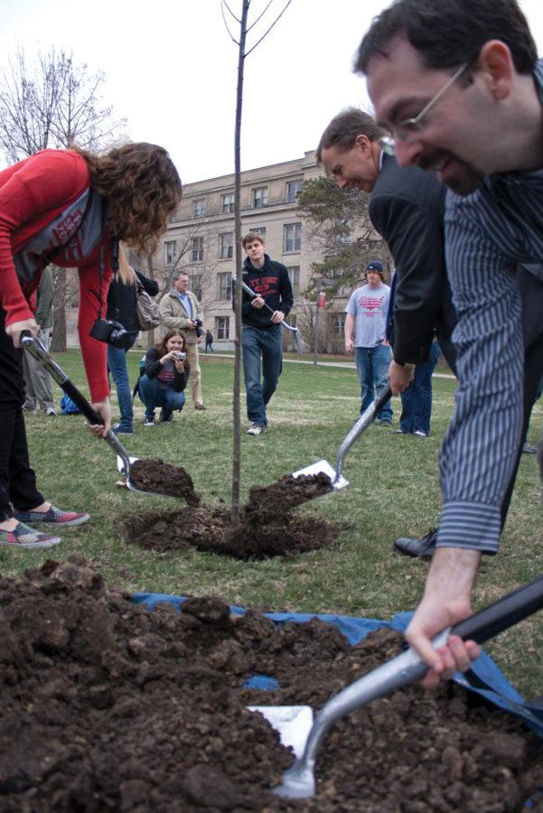 Ivy Christianson, junior in journalism and mass communication; Frank LoMonte, executive director of the Student Press Law Center; and Adam Kissel, vice president of programs for the Foundation for Individual Rights in Education, put dirt on the Liberty Tree on Thursday, April 7, on Central Campus. The Liberty Tree was planned on campus as part of the Liberty Tree initiative, which promotes First Amendment activities across the nation.