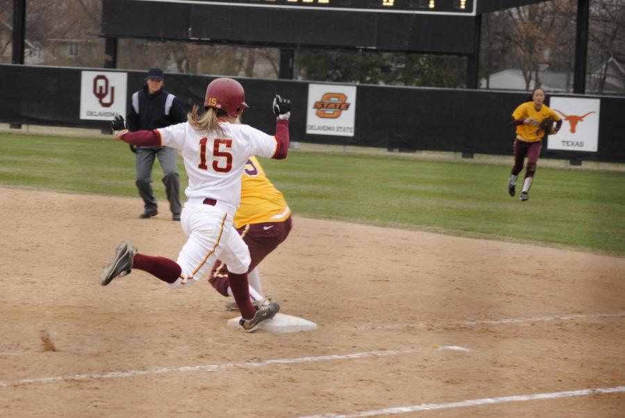 ISU outfielder Heidi Kidwell lunges for first base as the last out is made in the Cyclones first game Thursday. Iowa State lost 1-0 to Minnesota in game one of the Thursday doubleheader.