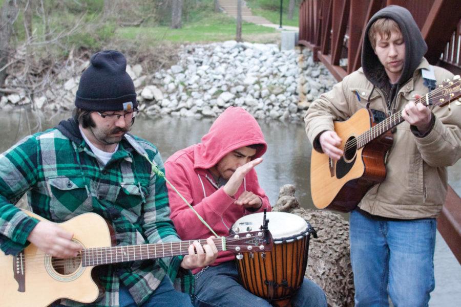 Local artist "Doctor Murdock" spends time practicing their music at Brookside Park on Saturday, April 23. The group practiced such songs as "Crocodile People" and "Babel on Mike." 