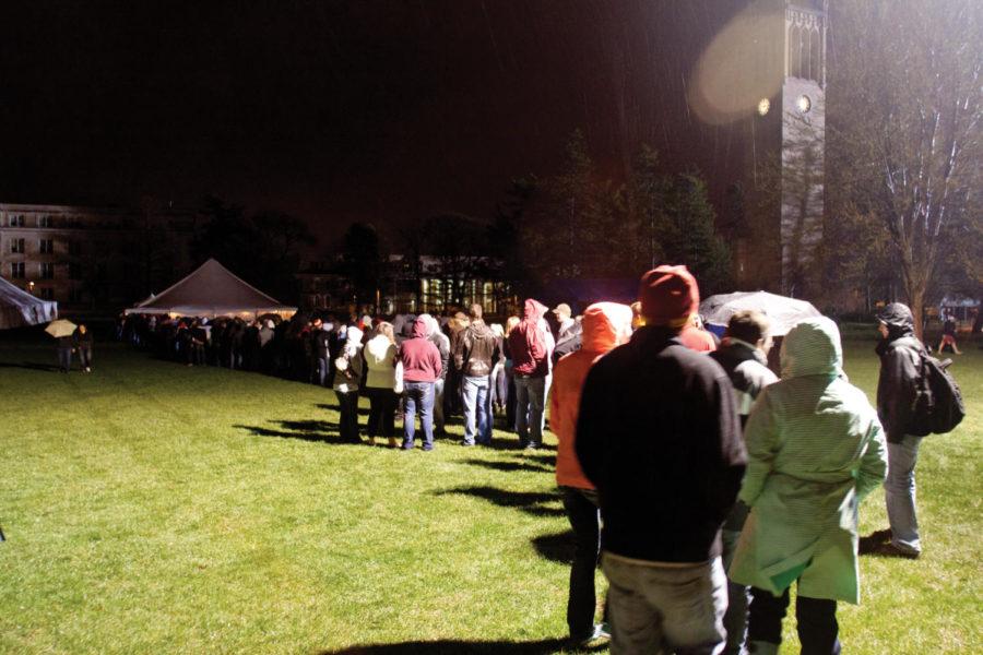 Friends and family brave the cold rain to stand in line for the pancake feed on Friday, April 15 on Central Campus. Students, faculty and anyone brave enough to stay up late were treated to homemade pancakes and sausages. 