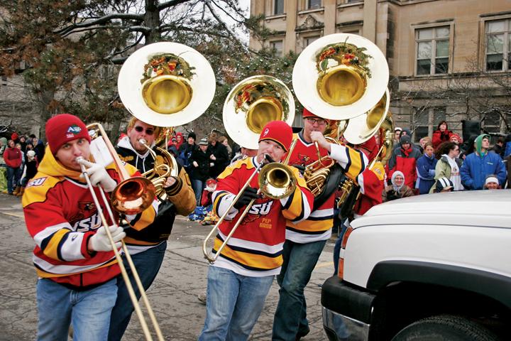 Members of the Hilton Magic Pep Band play the ISU Fight Song during the 2008 VEISHEA parade in front of Beardshear.