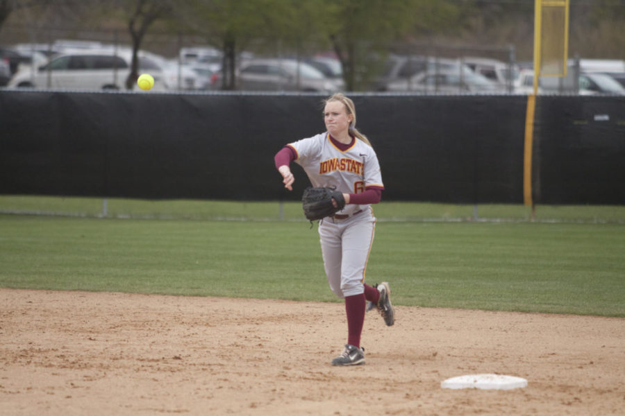 Shortstop Sara Davison throws the ball to first base for the out against Kansas on Saturday, April 23. Davison was 0-3 on the day, but scored a run. Kansas prevailed with an 8-6 victory.