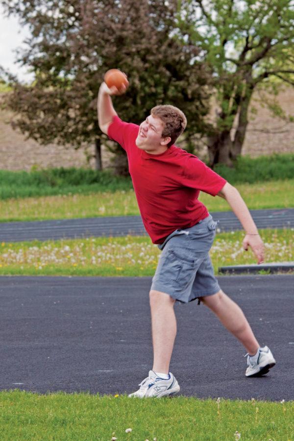 Joshua Ullestad practices his shot put at Iowa Falls-Alden High School to prepare for the Special Olympics Summer Games held May 26 through May 28 in Ames. Photo: Manfred Brugger/Iowa State Daily
