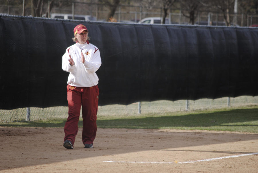 ISU coach Stacy Gemeinhardt-Cesler encourages her players from her third-base coaching box during the game against Northern Iowa on Tuesday, April 5.