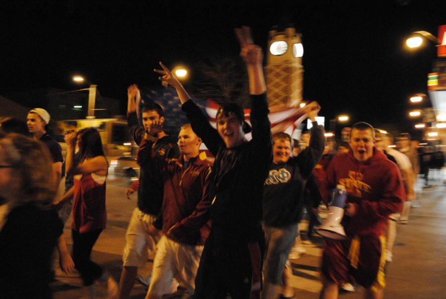 Community members celebrate the announcement of the death of Osama bin Laden on Welch Avenue on Sunday night. 
