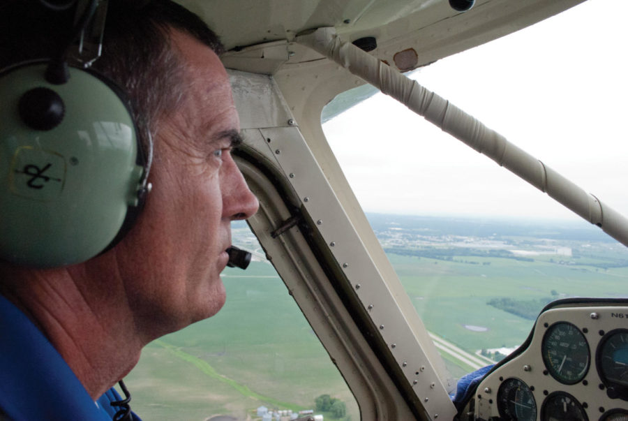 Pilot Glen Ferguson takes passengers on a flight above the Ames
countryside and the Iowa State campus on June 25. Ferguson and his
passengers took off from the Ames Municipal Airport. Photo: Jordan
Maurice/Iowa State Daily
