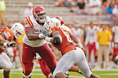 Offensive lineman Kelechi Osemele blocks Texas defensive lineman Sam Acho on Saturday, Oct. 23, in a game at Texas. The Cyclones defeated the Longhorns 28-21. 