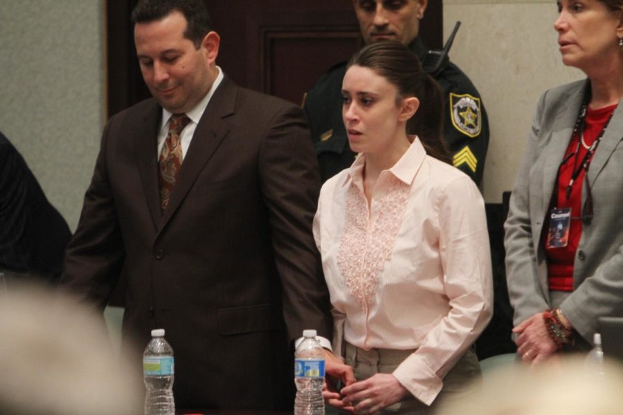 Casey Anthony reacts to being found not guiity on murder charges
at the Orange County Courthouse in Orlando, Florida on July 5. At
left is her attorney Jose Baez.
