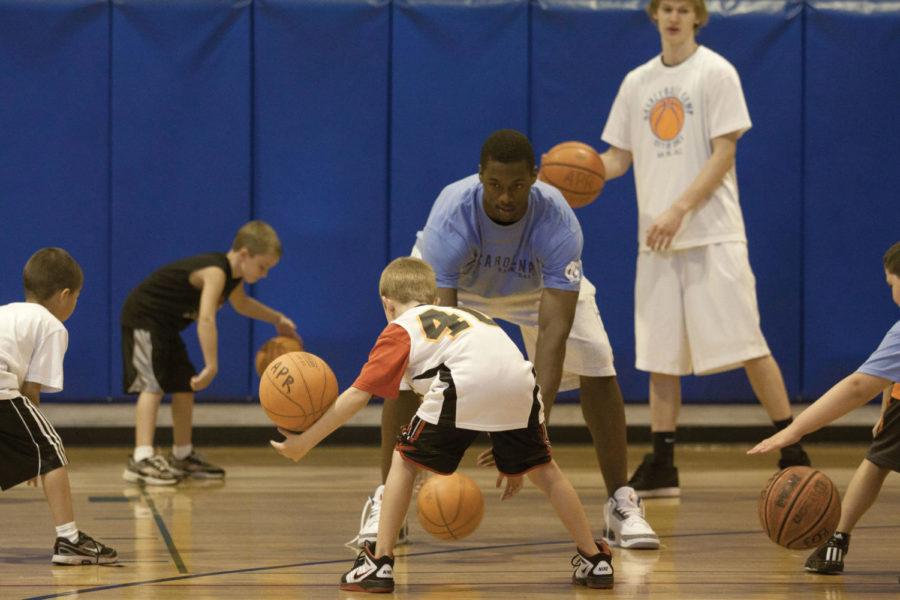 Harrison Barnes, a freshman at University of North Carolina, is
a 2010 Ames High School graduate. Barnes plays small forward for
the Tar Heels. Barnes was a guest coach at the Harrison Barnes
basketball camp at Ames City Hall, where he worked with kids in
grades 3 through 10 on July 30. 
