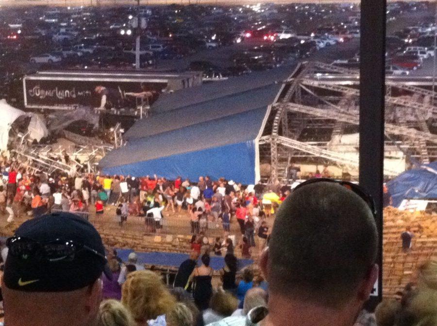 iReporter Agnes Schade captured this photo after a powerful gust
of wind caused a stage to collapse just before the band Sugarland
was about to perform at the Indiana State Fair in Indianapolis on
Saturday, Aug. 13, 2011.
