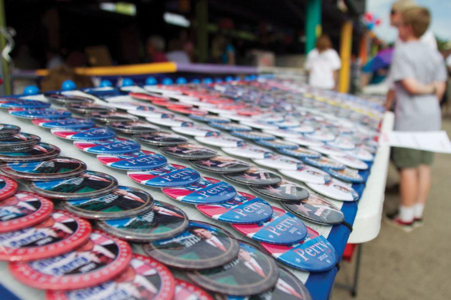 Buttons+endorsing+Republican+presidential+candidates+are+set+out%0Afor+sale+on+a+table+outside+the+Polk+County+Republican+Party+Summer%0APicnic+on+Saturday%2C+Aug.+27%2C+at+Jalapeno+Petes+on+the+Iowa+State%0AFairgrounds+in+Des+Moines.+Other+tables+were+set+up+for+information%0Aabout+the+three+presidential+candidates+speaking+at+the+event%3A+U.S.%0ARep.+Ron+Paul%2C+Texas+Gov.+Rick+Perry+and+U.S.+Rep.+Thaddeus%0AMcCotter.%C2%A0%0A