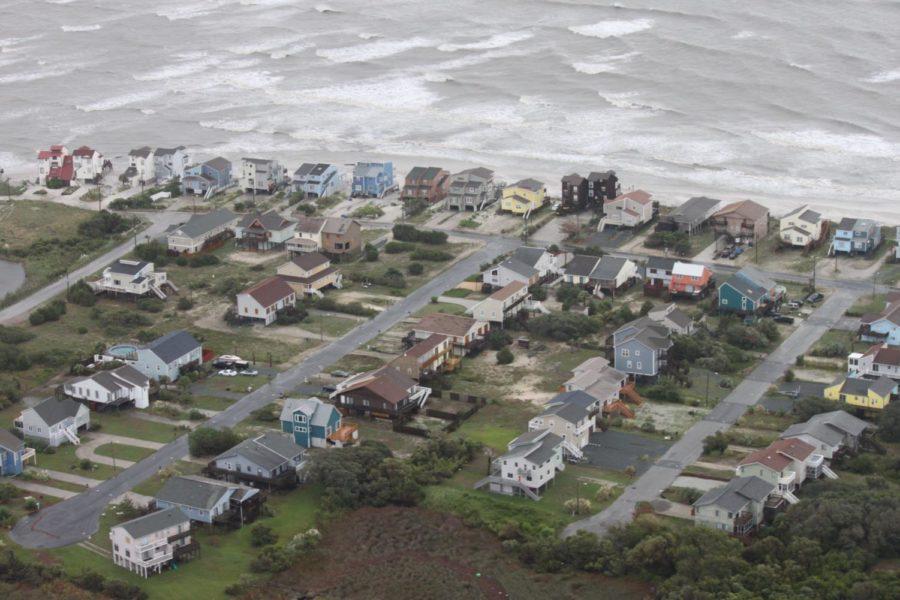 CNN Producer Brian Rokus was on the first flight by the USCG to
survey the North Carolina Coast line. Fifth District Rear Admiral
William Lee was live on CNN during the 8 p.m. broadcast, describing
the scene. He reported limited damage due to Hurricane Irene in the
initial survey.
