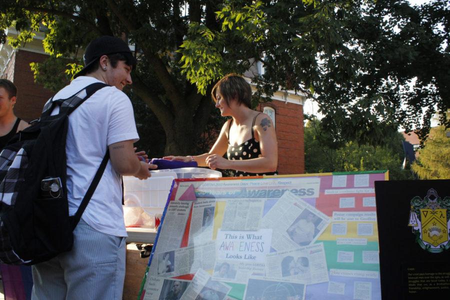 Students visit the stands at the LGBTA ice cream social and
kickoff Wednesday, Aug. 31, to learn more about the LGBT community
on campus. Attendees could have taken advantage of the tours the
LGBTSS Center was giving.

